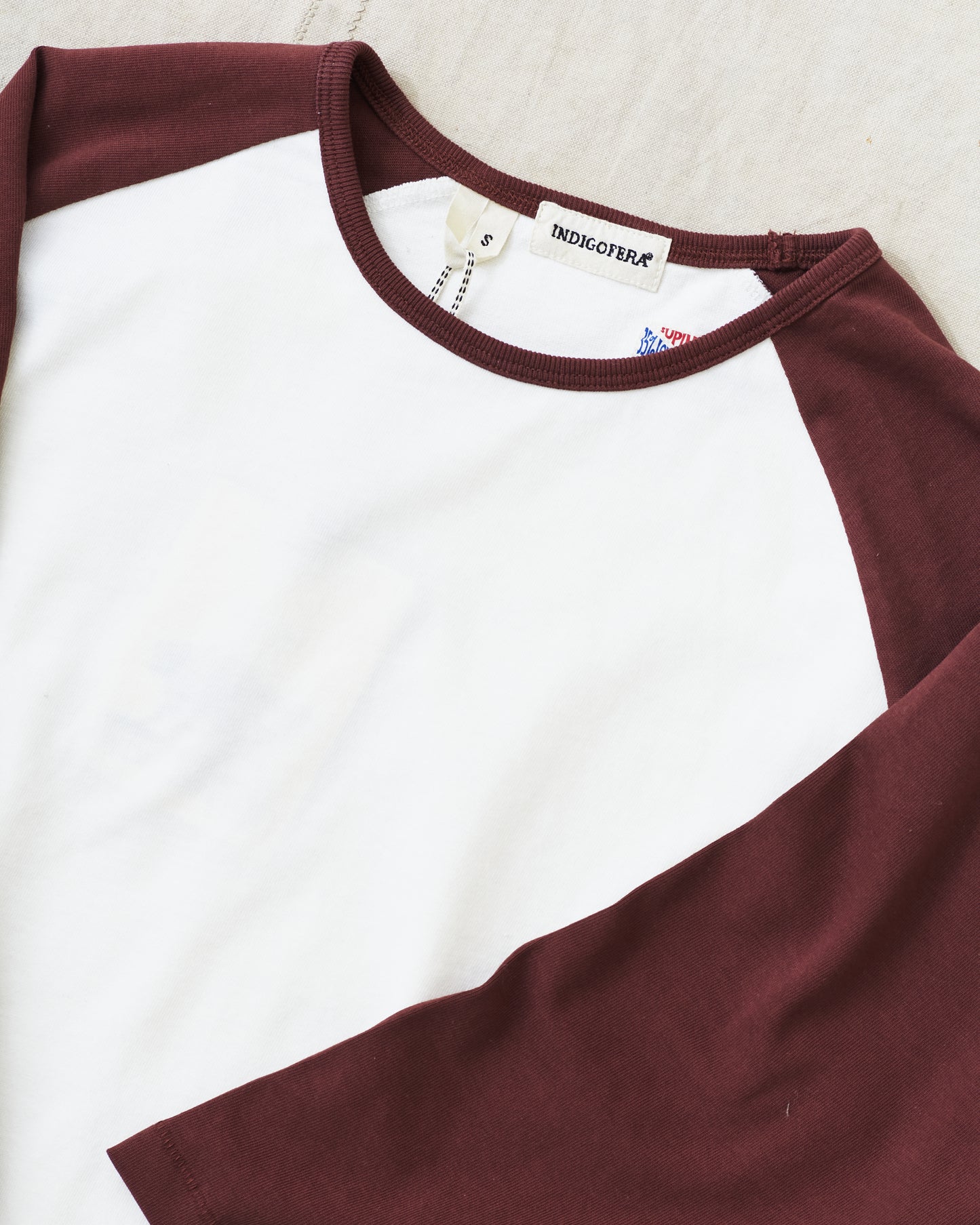 Indigofera Leon Raglan Sweater Cocatoo / Sassafras