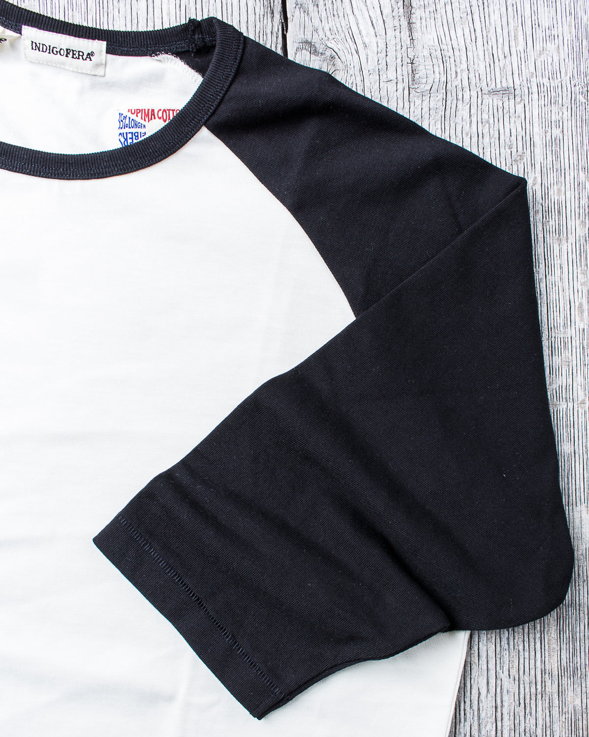 Indigofera Leon Raglan Sweater Cocatoo White / Black
