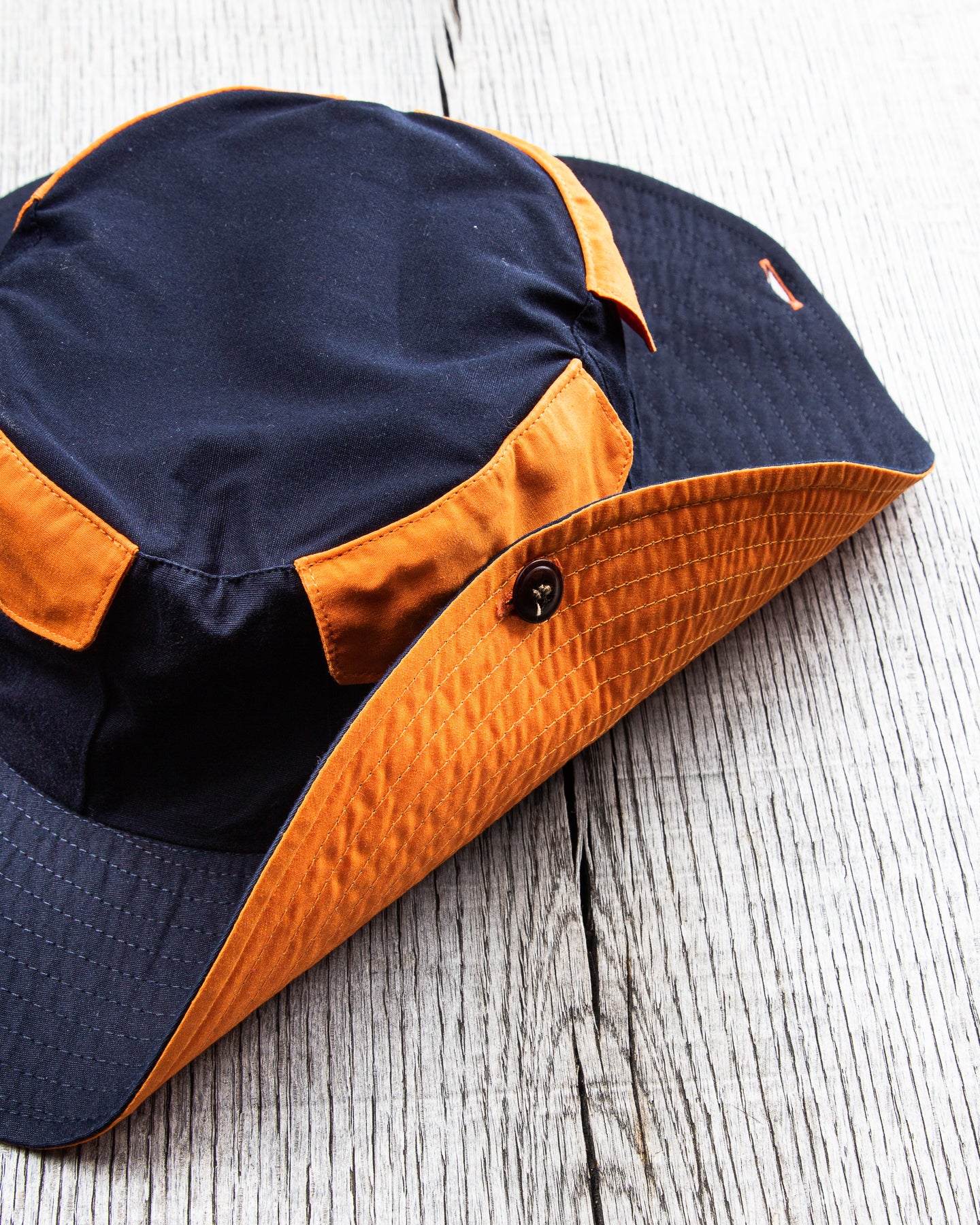 Indigofera x Second Sunrise Tur Pocket Hat Navy / Orange