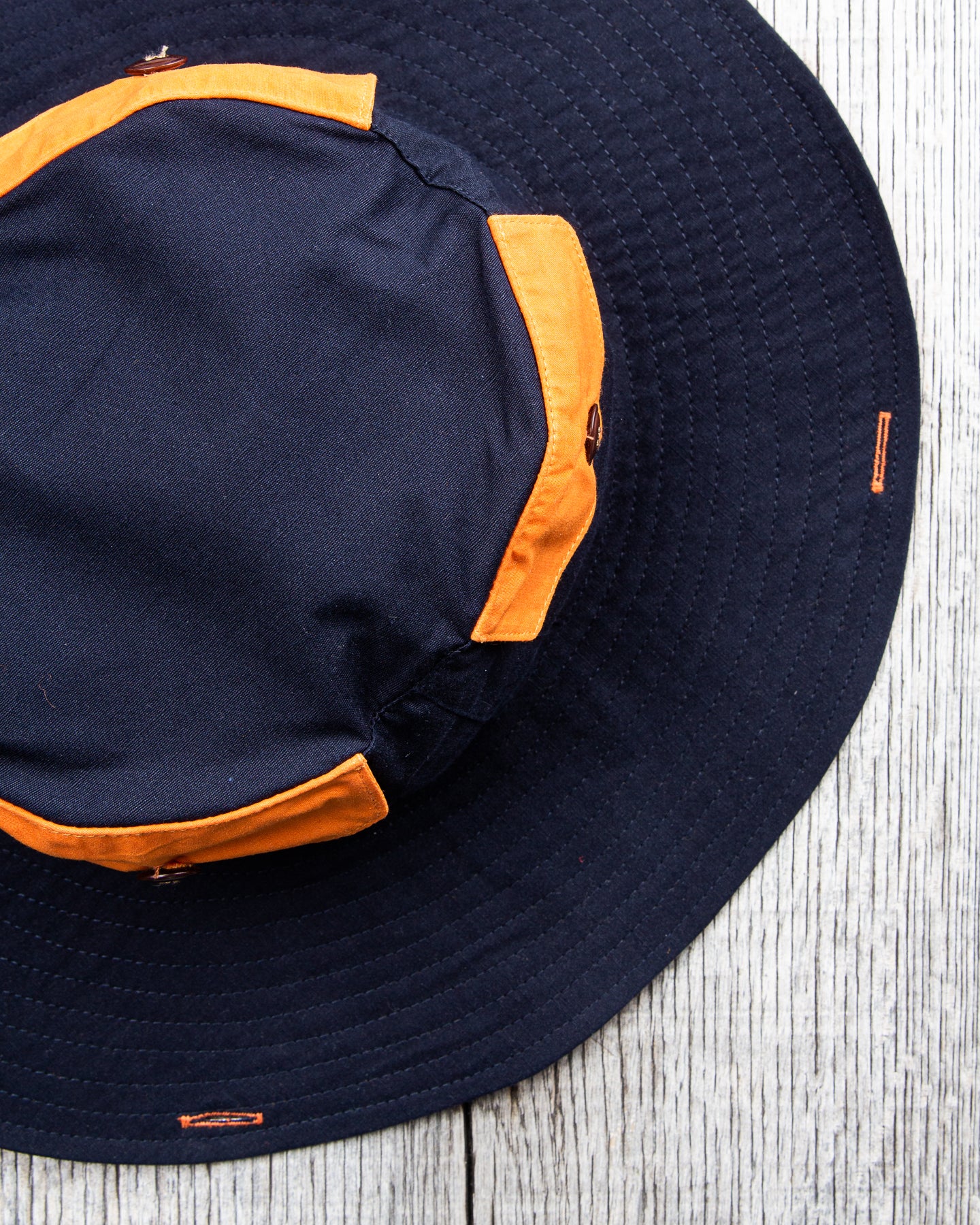 Indigofera x Second Sunrise Tur Pocket Hat Navy / Orange
