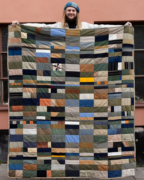 A quilt made of scraps & hemming cut offs