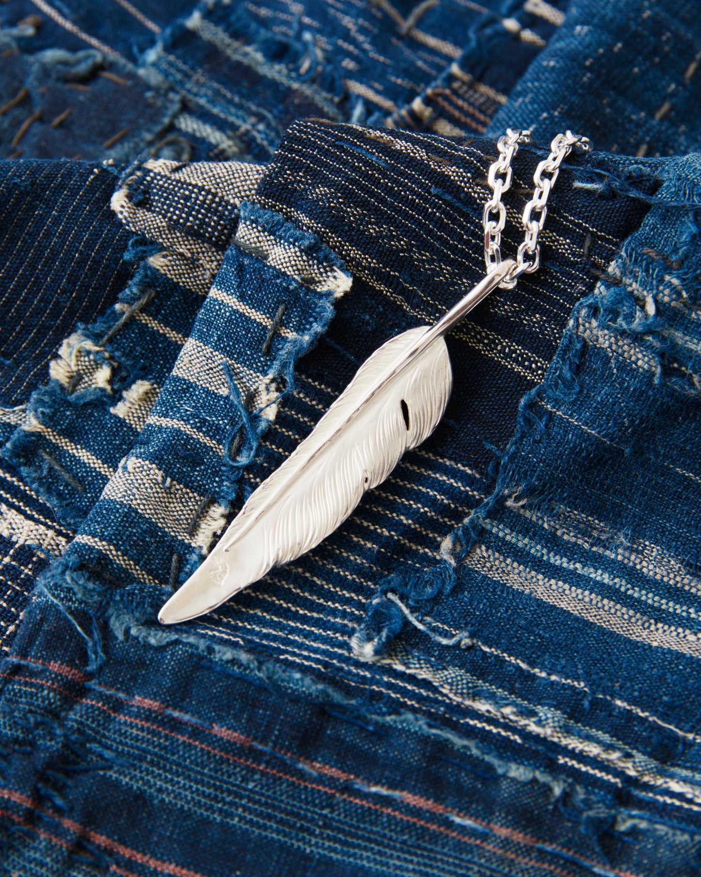 Larry Smith Natabane Feather (L) EFNL-0054-L