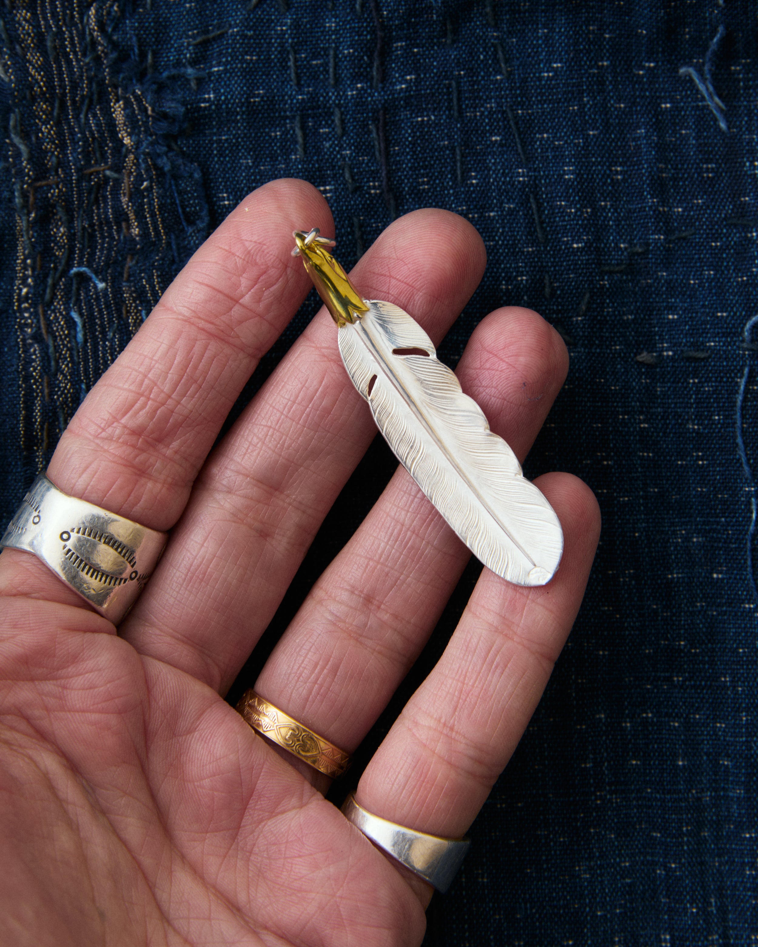 Larry Smith Eagle Head Feather Silver Pendent With 18K Gold Accent