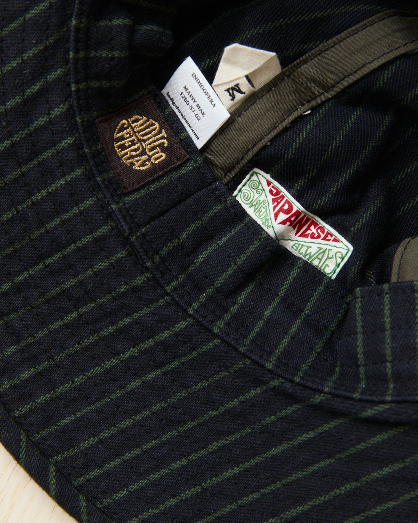 Indigofera Haisy Mae Hat Viridecent Stripe Black/Green