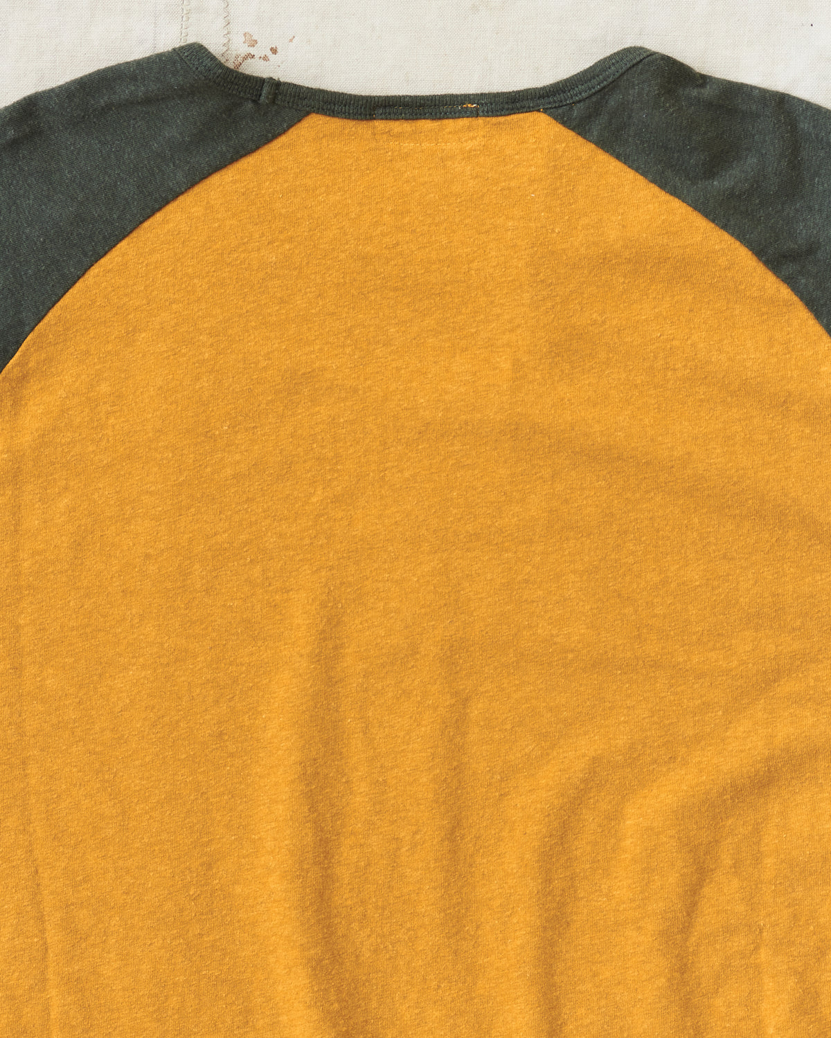 Indigofera Leon Raglan Sweater Orange / Green Resin