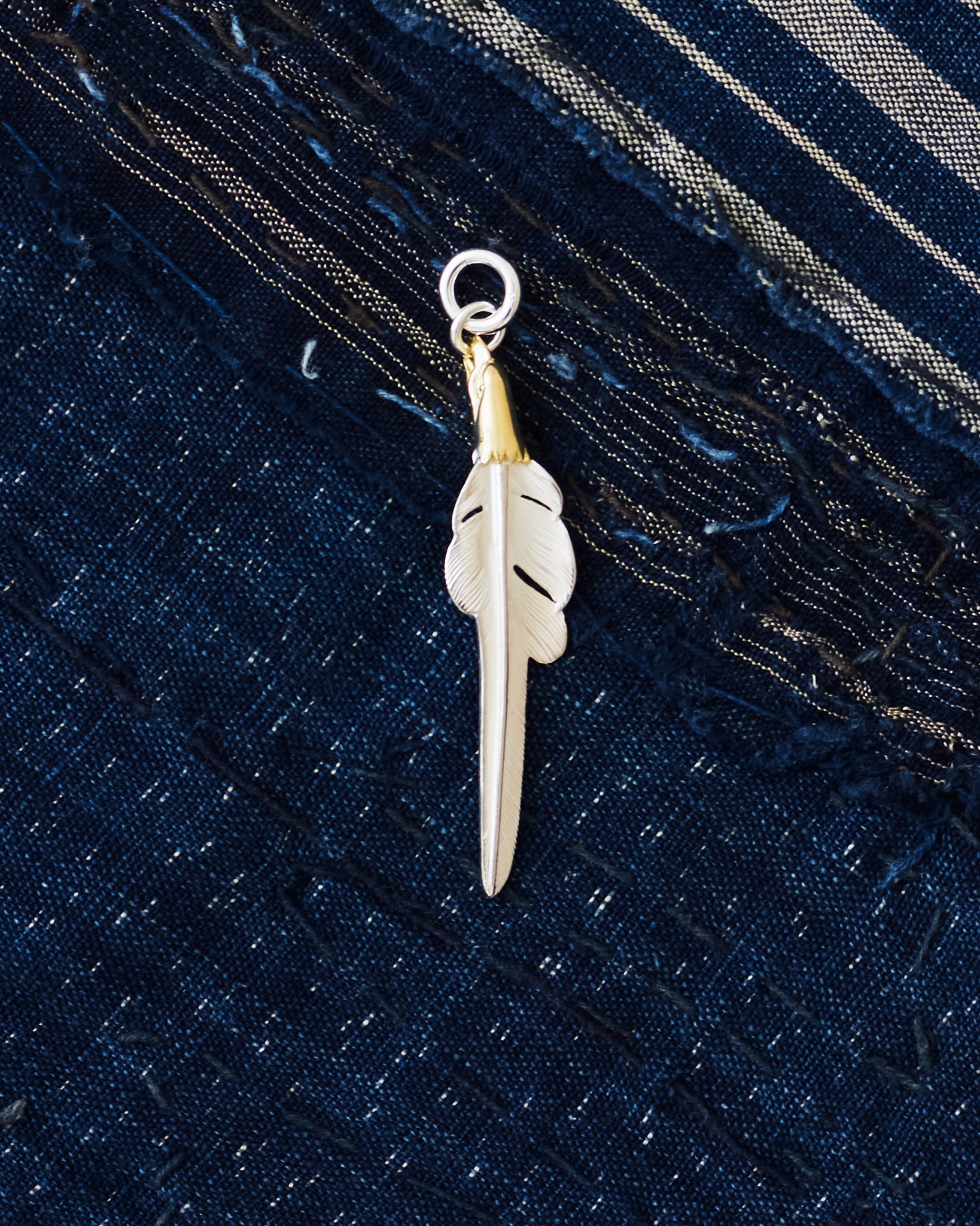 Larry Smith Eagle Head Kazekiri Feather pendant with 18K gold accent, handcrafted in Japan
