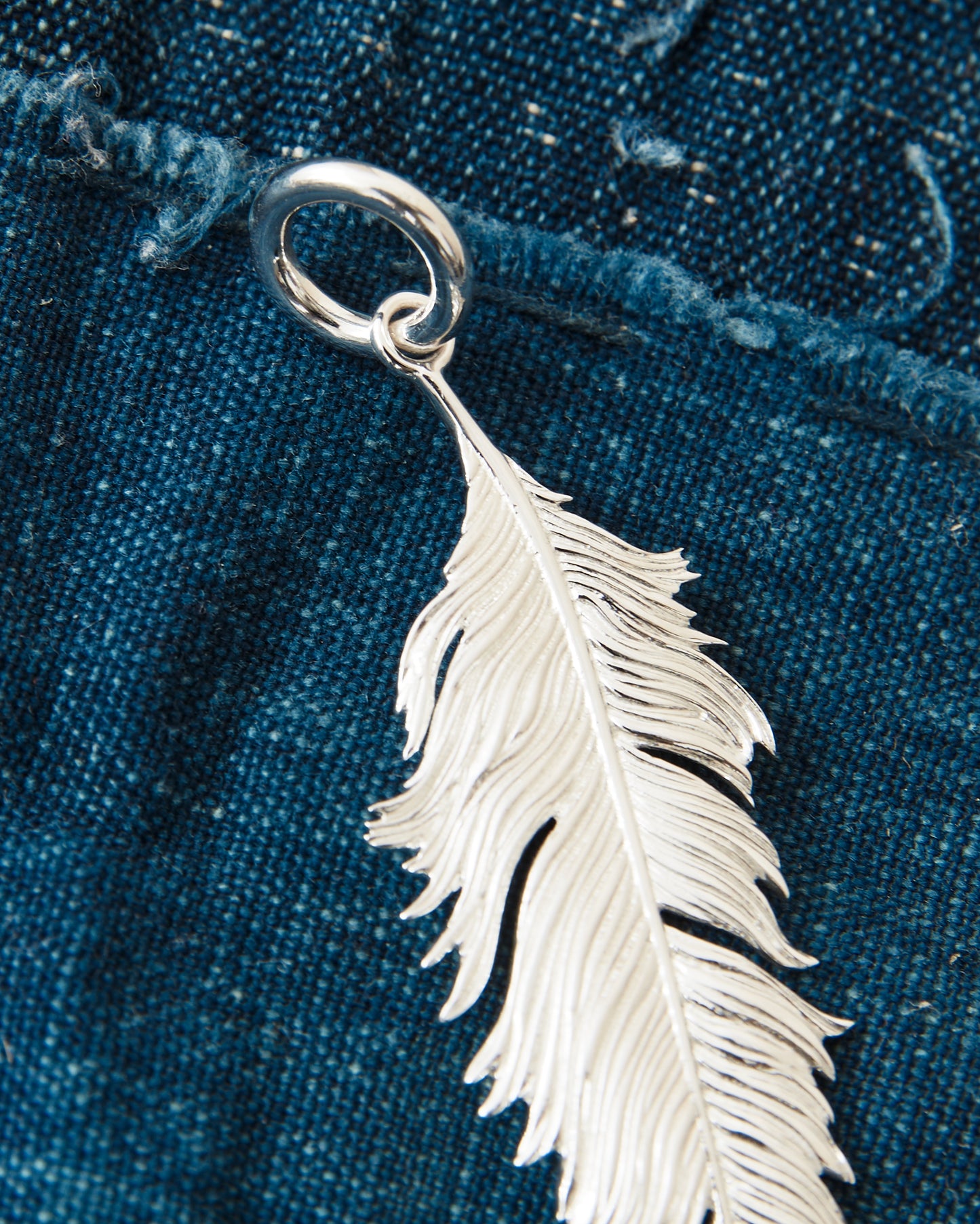 O.P Jewellery Skata Skata Big Feather