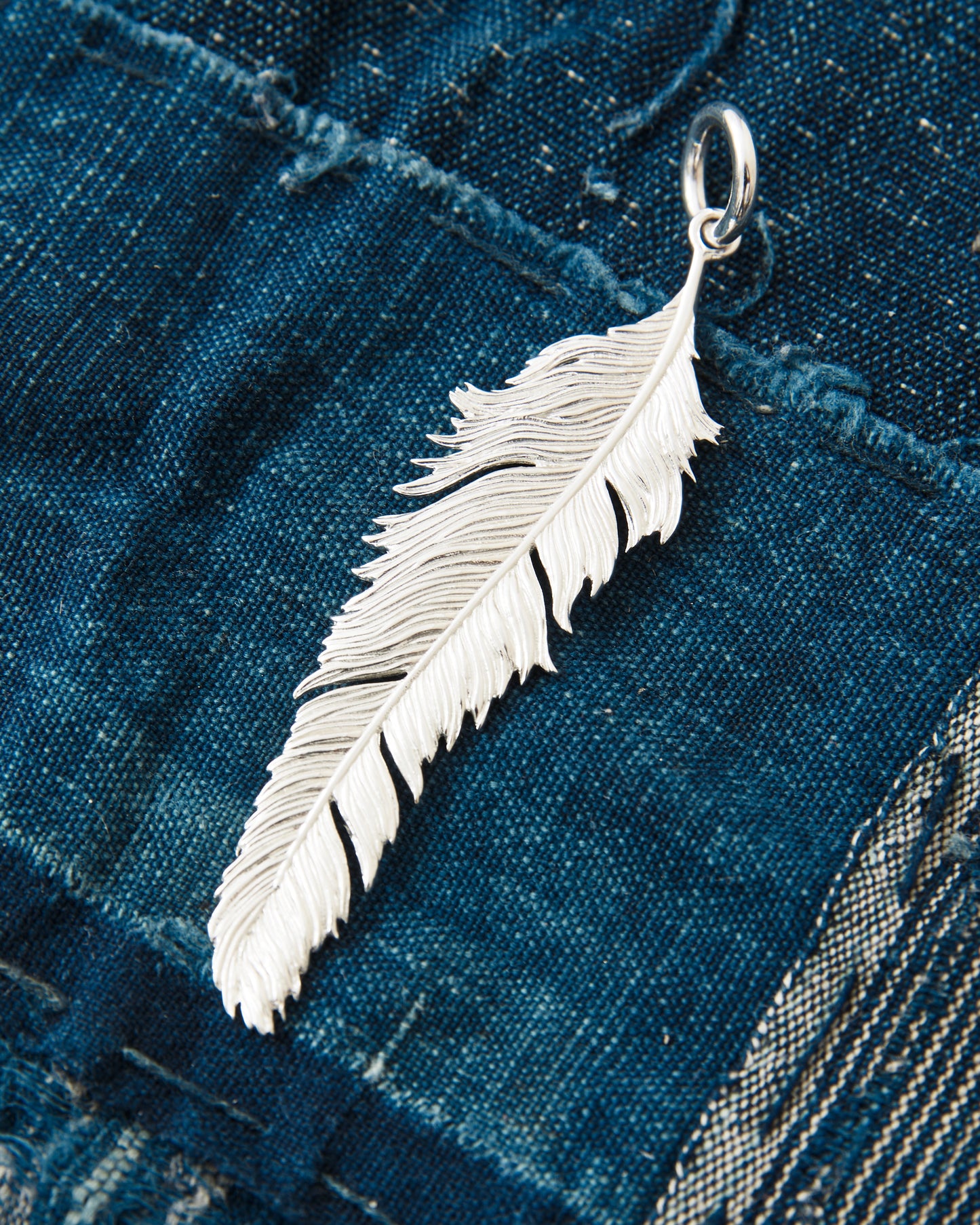 O.P Jewellery Skata Skata Big Feather