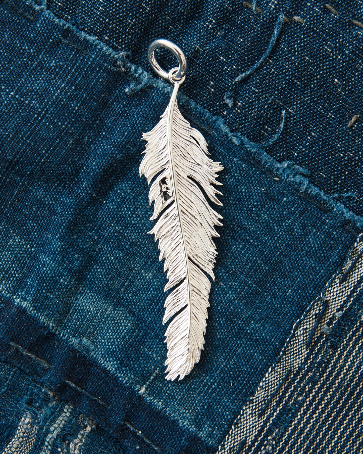 O.P Jewellery Skata Skata Big Feather
