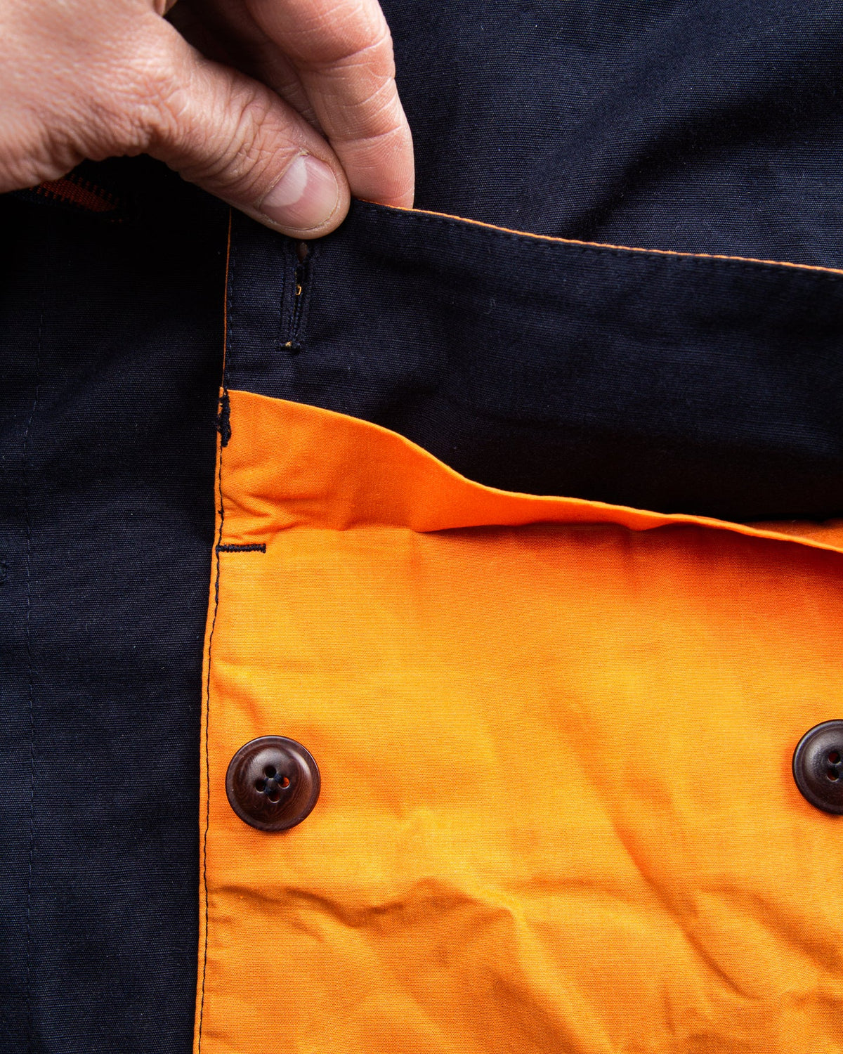 Indigofera x Second Sunrise Storm Jacket Navy / Orange
