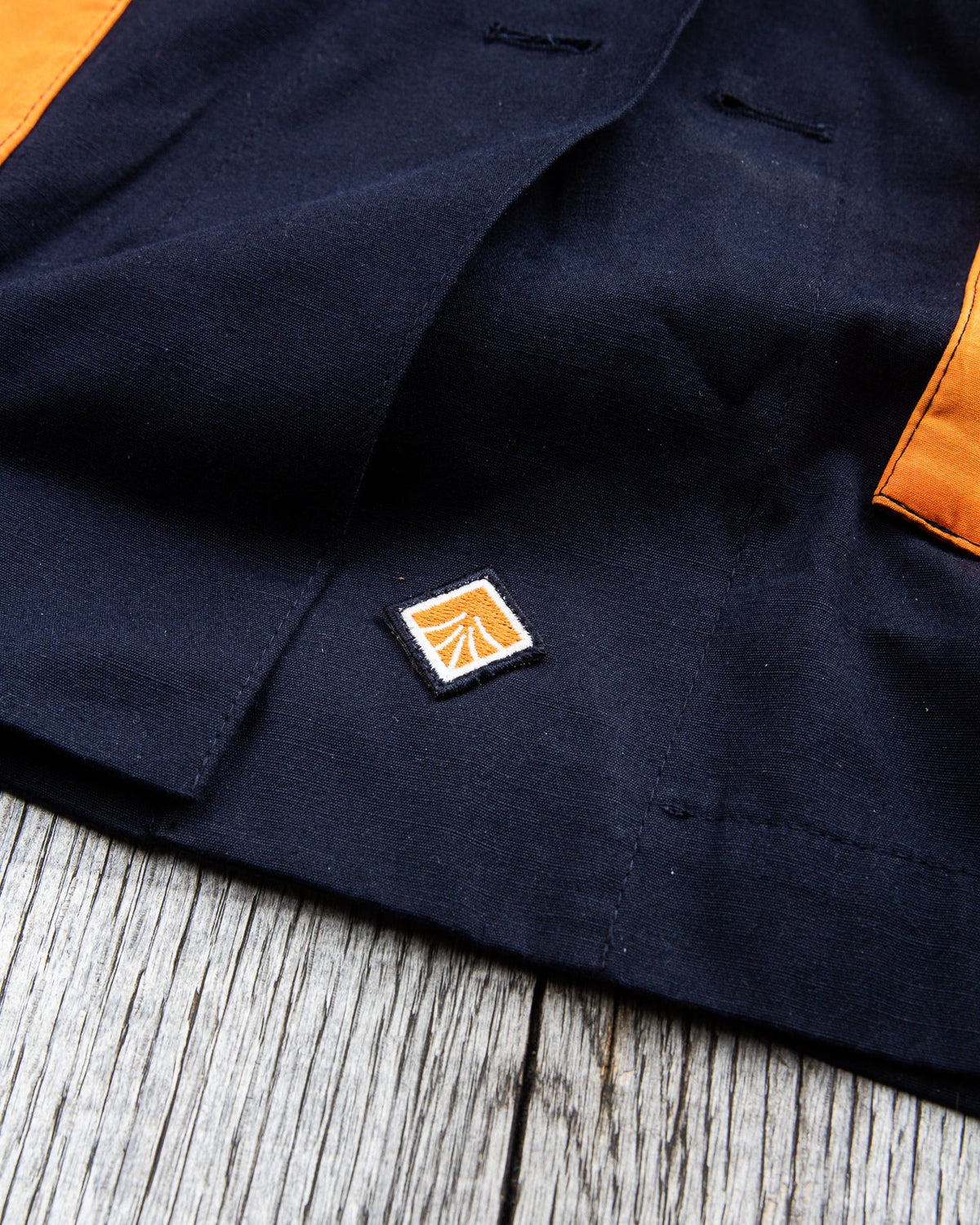 Indigofera x Second Sunrise Storm Jacket Navy / Orange