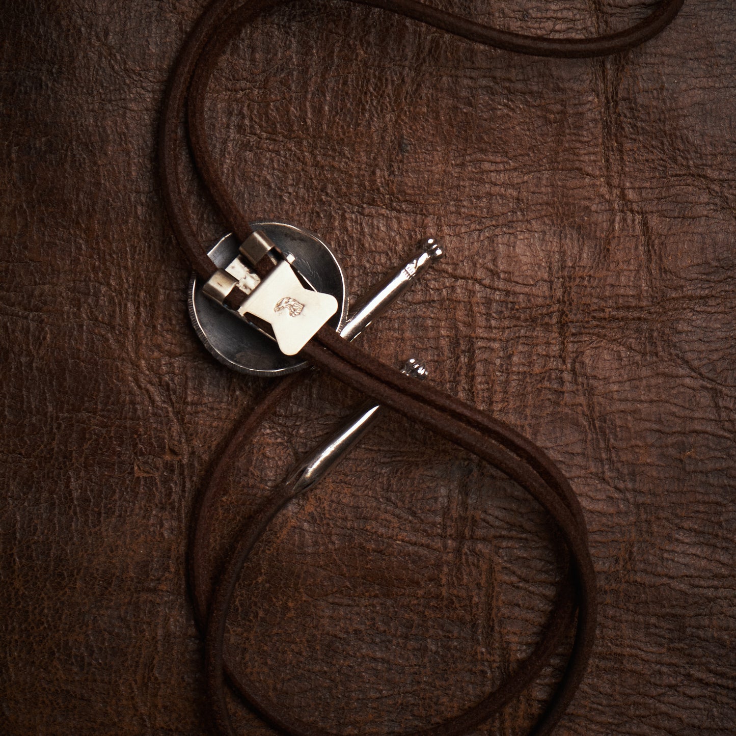 Larry Smith Bolo Tie Star Coin Concha Brown OT-0125